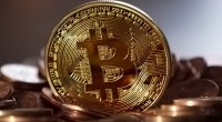 Imagem da matéria: Bitcoin não irá substituir o ouro, diz analista de empresa de investimentos