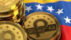 Moeda petro sob uma bandeira da Venezuela.