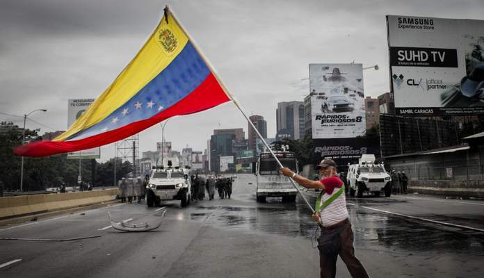 Imagem da matéria: Com país em crise, venezuelanos batem recorde na compra de bitcoin