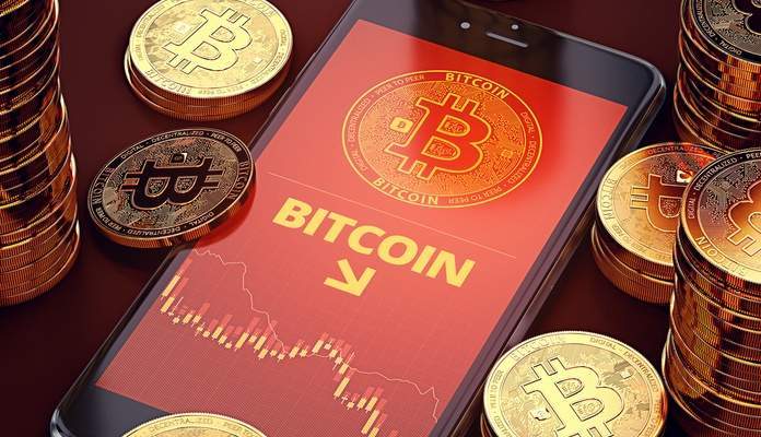 Imagem da matéria: Bitcoin cai e é negociado abaixo de US$ 11.000