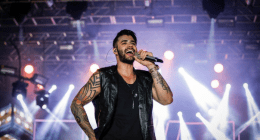 Gusttavo lima canta em seu show sertanejo