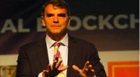 tim draper veste gravata com tema do bitcoin em evento Global Blockchain Forum 1