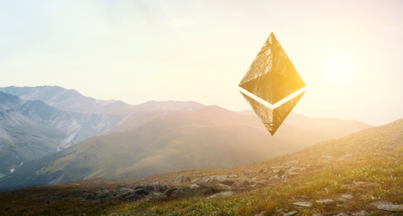 Símbolo Ethereum com paisagem ao fundo