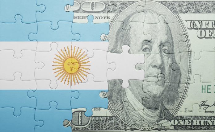 Imagem da matéria: Argentina proíbe compra de dólares para quem adquiriu criptomoedas nos últimos três meses