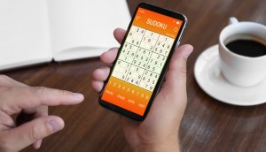 Celular com tela de Sudoku