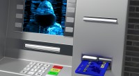 Tela de caixa eletrônico mostra um hacker encapuzado