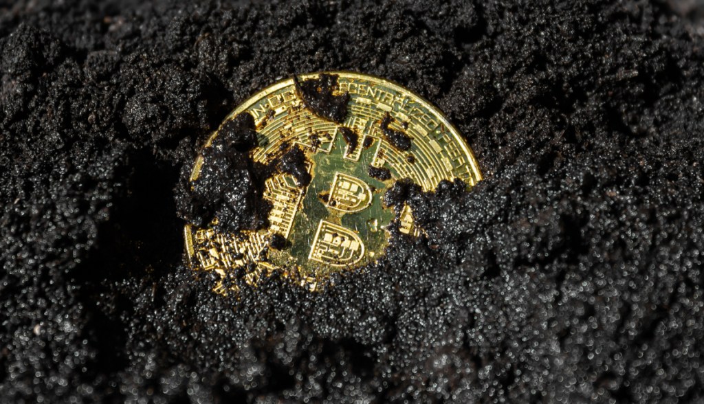 Bitcoin coberto de lama