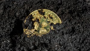 Bitcoin coberto de lama