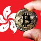 moeda de bitcoin à frente da bandeira de hong kong