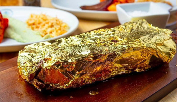 Imagem da matéria: Primeiro restaurante do Brasil a servir carne com ouro pertencia a divulgador de pirâmide de criptomoedas