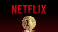 Moeda de bitcoin à frente de fundo escuro avermelhado com logomarca da Netflix