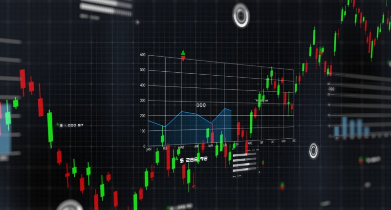 Telas mostrando gráficos do mercado financeiro