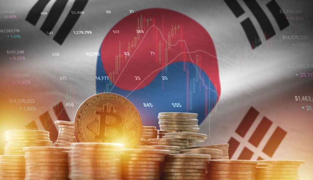 moedas de bitcoin e bandeira da coreia do sul