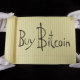 Imagem da matéria: Icônico papel escrito “Compre Bitcoin” é vendido por R$ 5,1 milhões em leilão