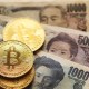 moedas de Bitcoin sobre notas de ienes